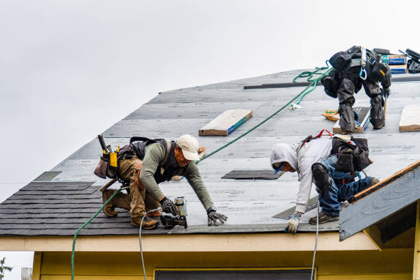 Professional Gutter Installation technician working in Old Westbury, NY